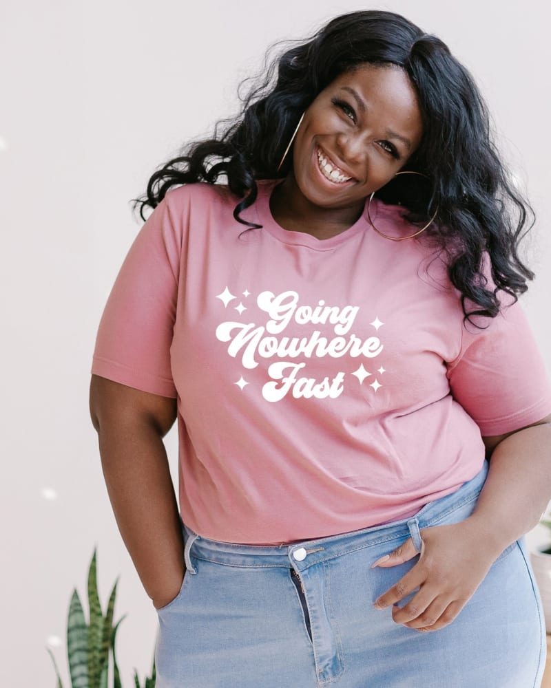 Front of a model wearing a size XL Going Nowhere Fast Short Sleeve Graphic Tee in Mauve by Simply Sage Market. | dia_product_style_image_id:283653